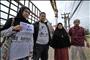 Family members stand outside Pattani central prison (photo: Reuters - Surapan Boonthanom)