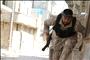 A Free Syrian Army fighter runs for cover near Nairab airport in Aleppo June 12, 2013 (photo: Reuters - Hamid Khatib)