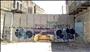 "May the temple be built soon in our time" this painting proclaims in Hebrew in H2, the legal wasteland inside Hebron