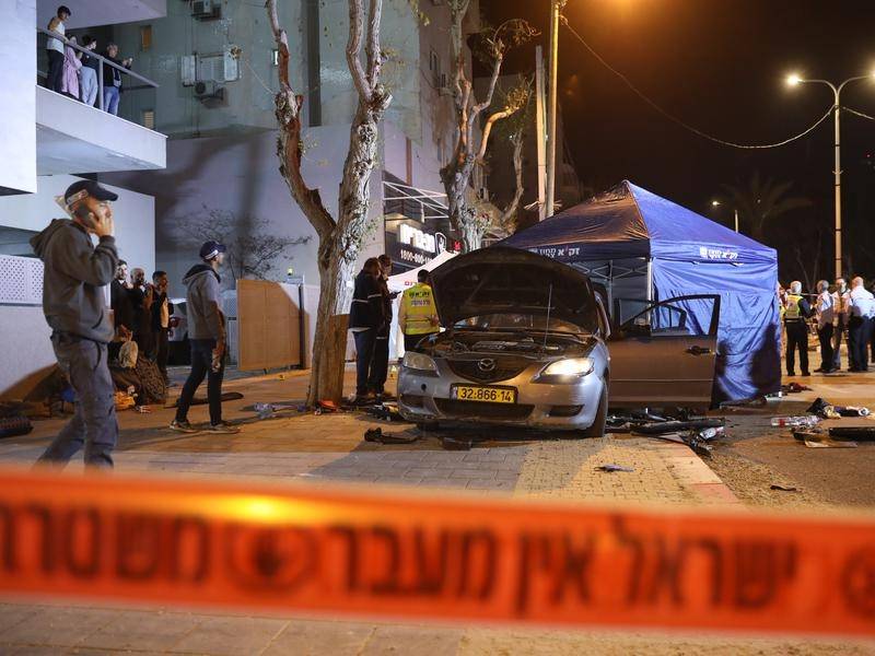 Two Israeli police officers killed in gun attack claimed by Islamic State group