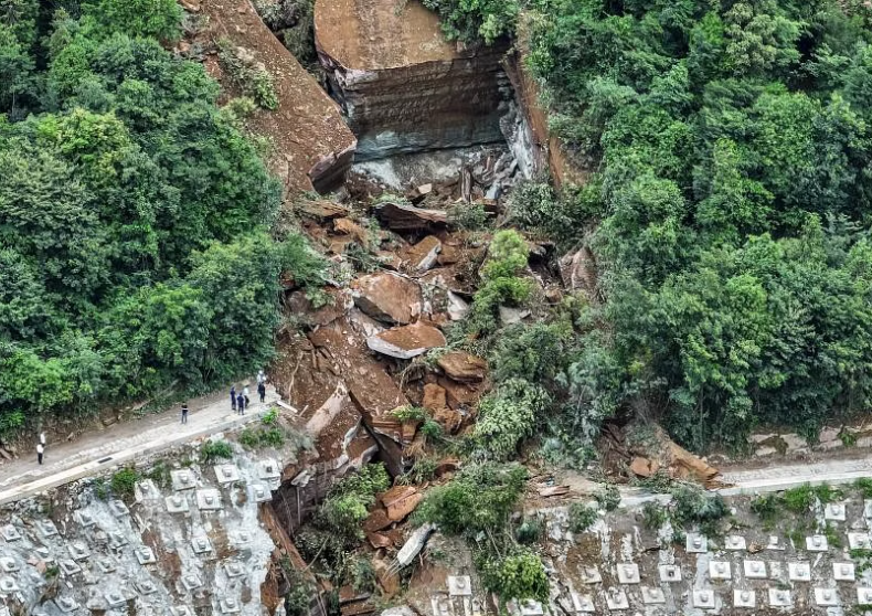 One dead, 7 missing in central China highway landslide