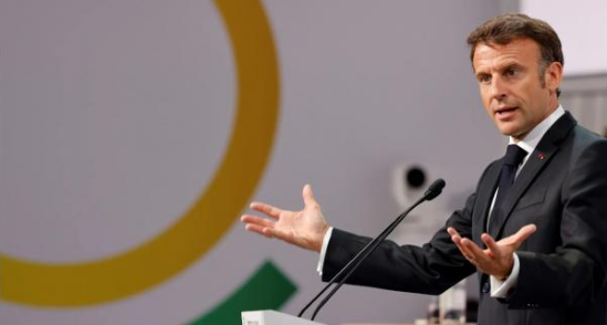 Macron says global lending system must adapt to fight climate change at Paris summit