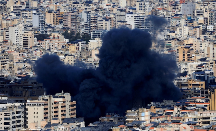 Israel strikes Beirut's southern suburbs after warning