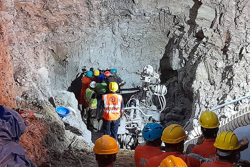 Indian rescuers struggle to reach boy, eight, trapped in well