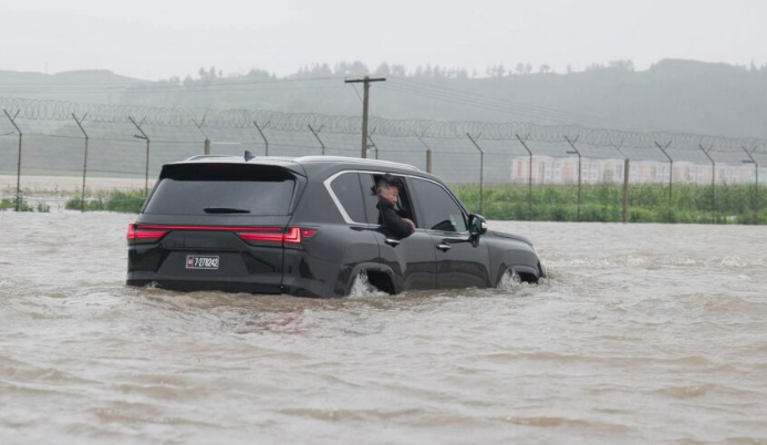 5,000 people rescued from flooding in North Korea in evacuation efforts led by Kim