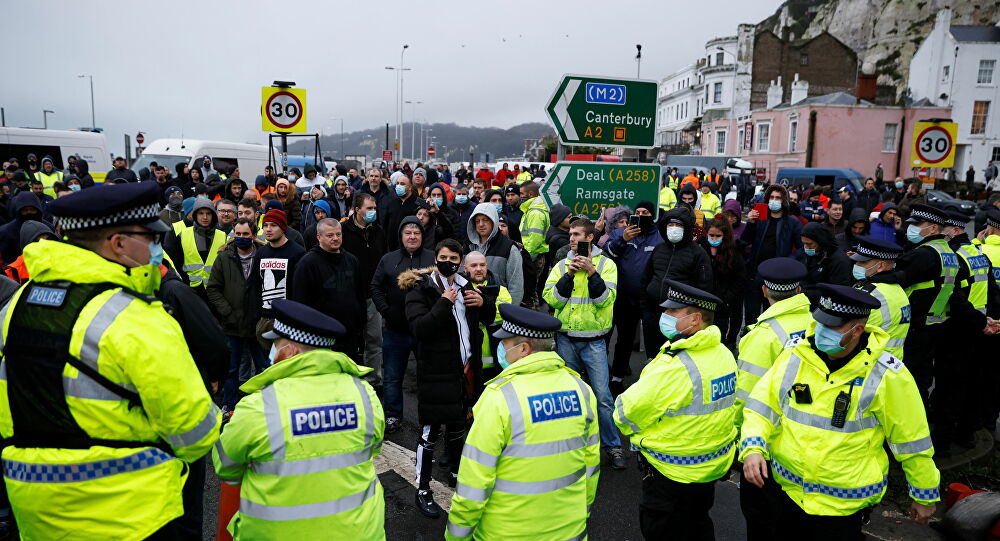 Anger boils over in Dover as stranded truckers demand to leave UK