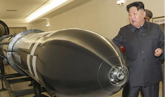 Kim Jong Un tells North Korea arms factories to boost capacity