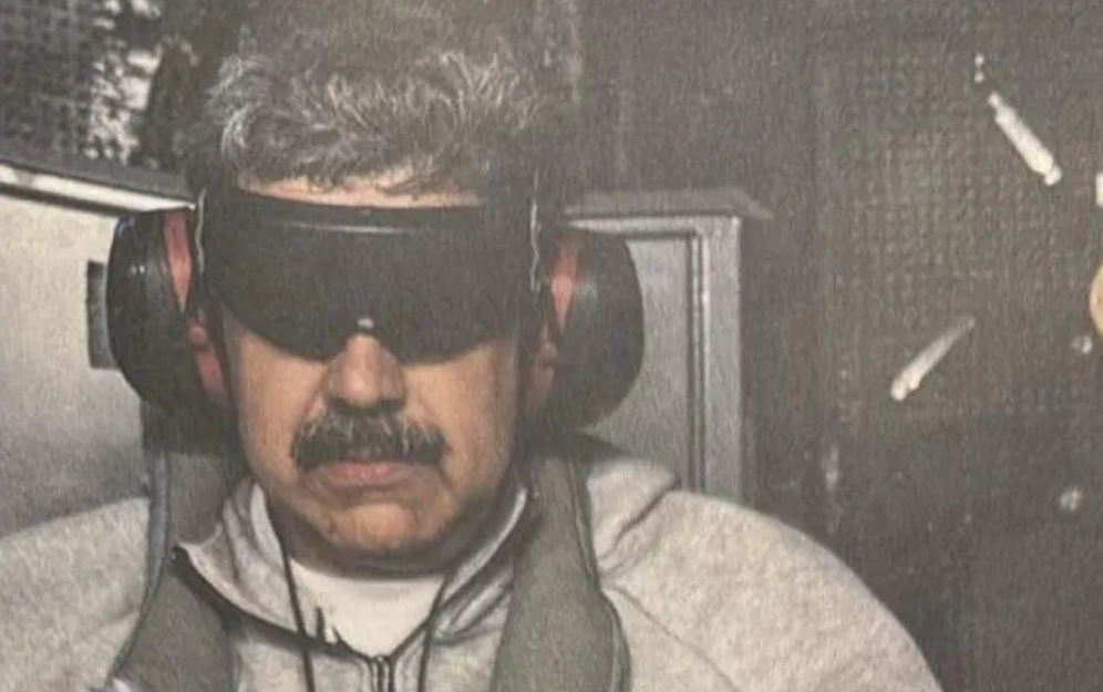 With covered eyes .. Trump posts photo of Maduro