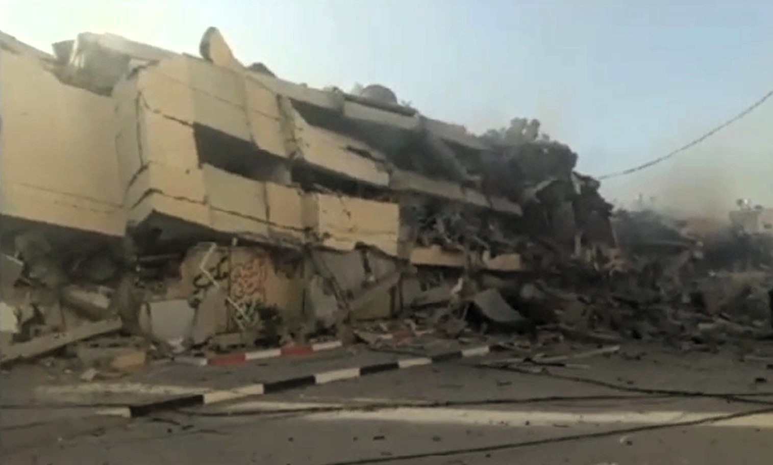 Israeli warplanes destroy four residential towers in the central Gaza Strip 