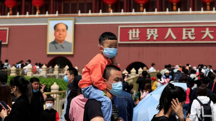 China passes three-child policy into law