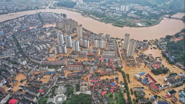 At least 11 killed and dozens missing as Chinese bridge collapses amid floods