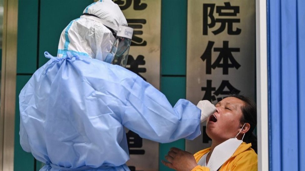 China confirms 14 new COVID-19 imported cases