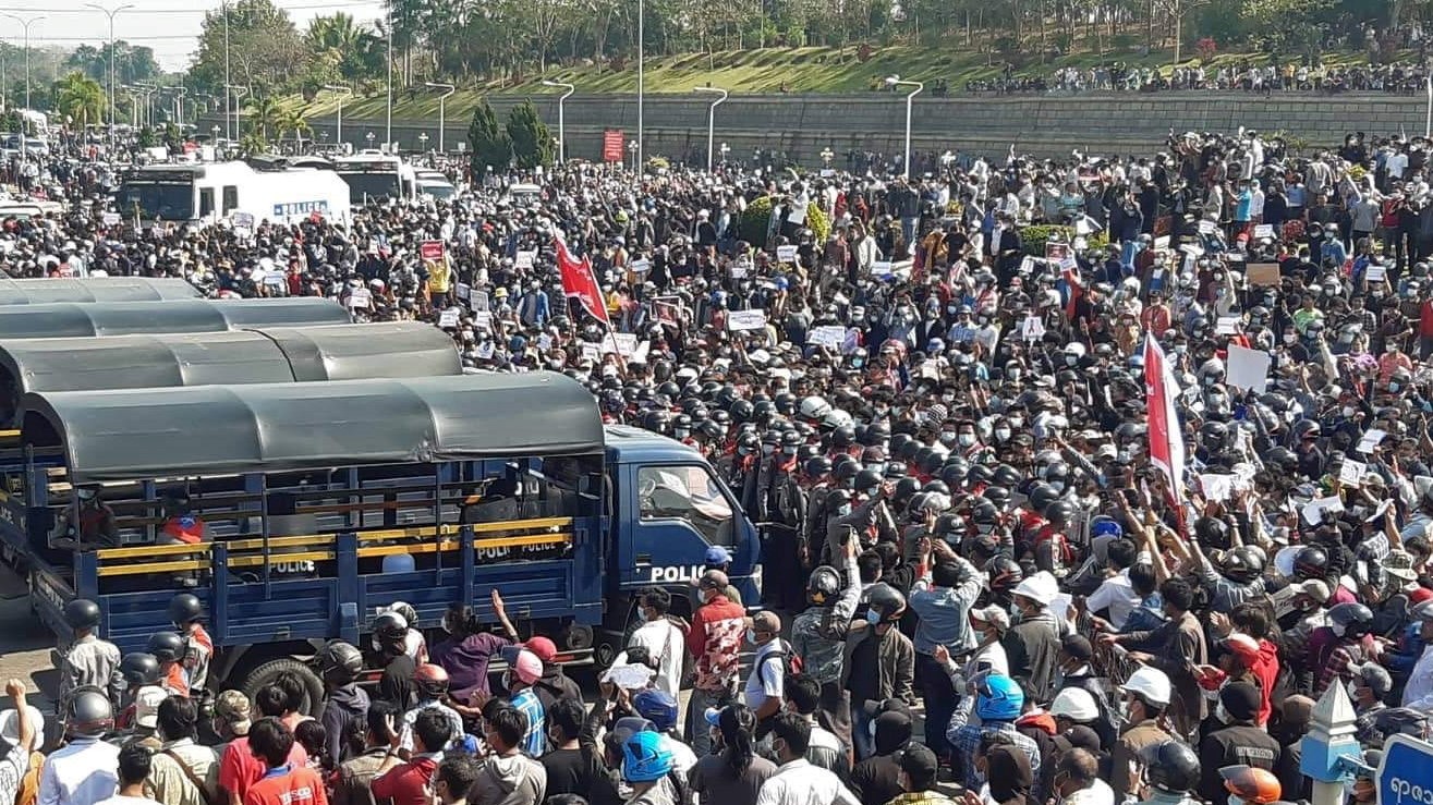 Myanmar coup: Police use water cannon as thousands strike