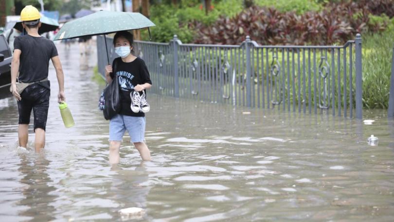 Thousands evacuated from floods in Chinas Sichuan province