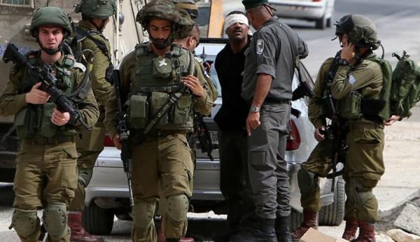 Israeli forces detain 14 Palestinians in West Bank raids